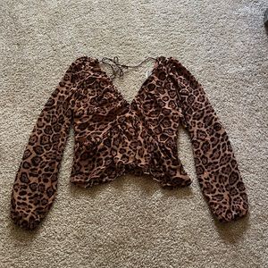 Cute cheetah print blouse with tie in back